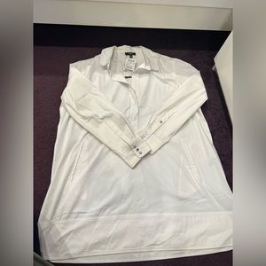 Premise woman’s white tunic